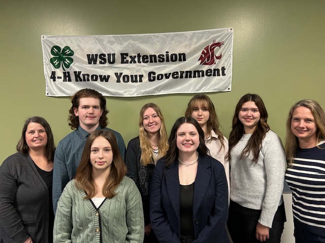 Students smiling while attending the conference